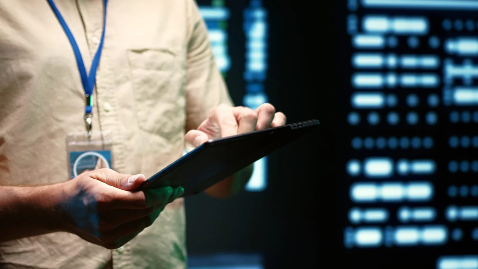 it-specialist-walks-through-server-rows Managed IT Services in Green Bay